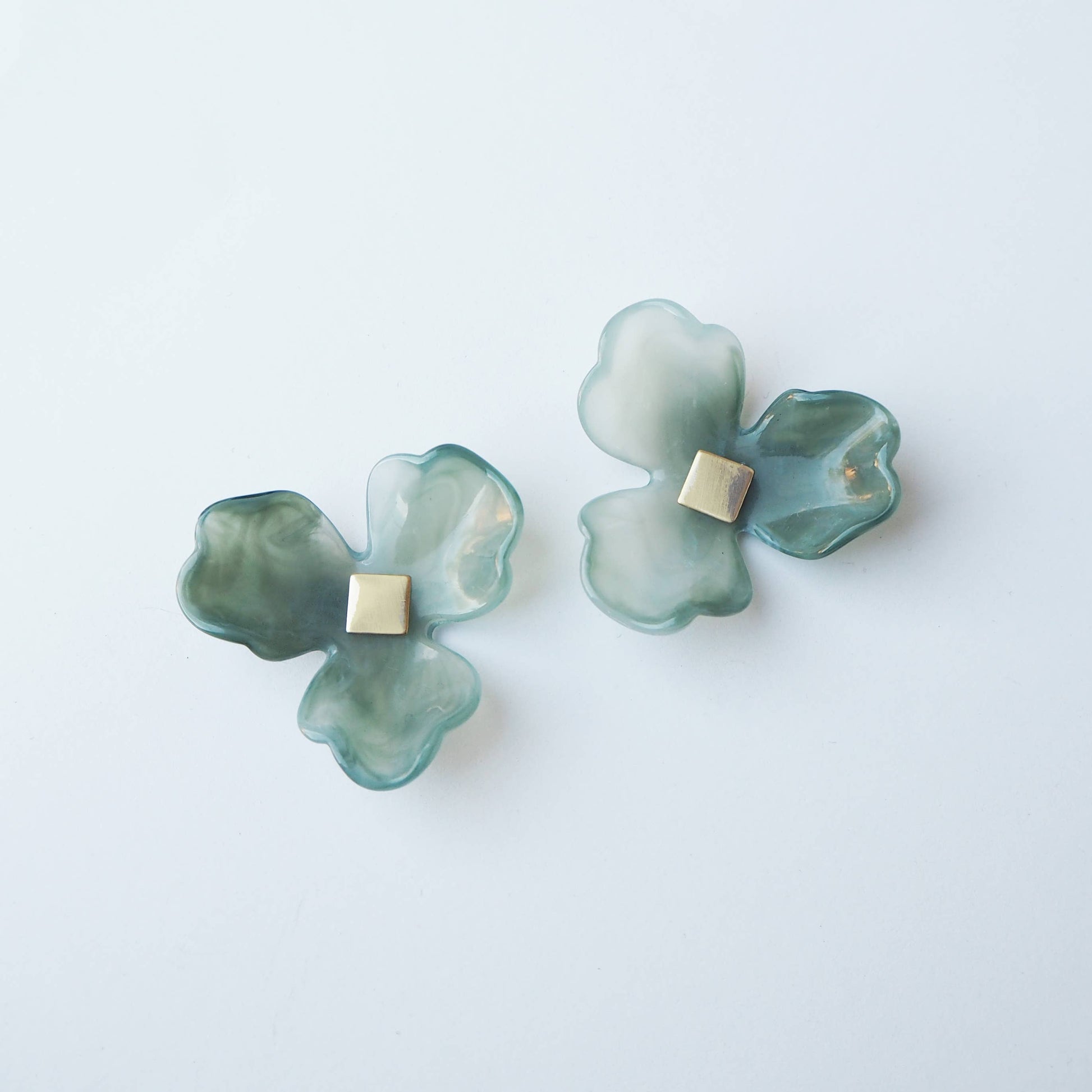 Eco-friendly biodegradable gift packaging and green flower stud earrings