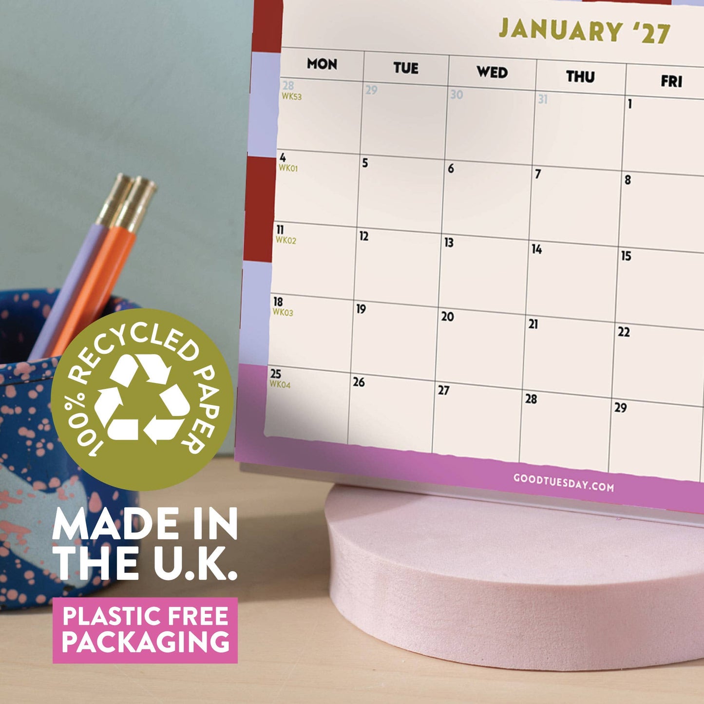 Close up of the spiral-bound recycled paper pages of the desk calendar