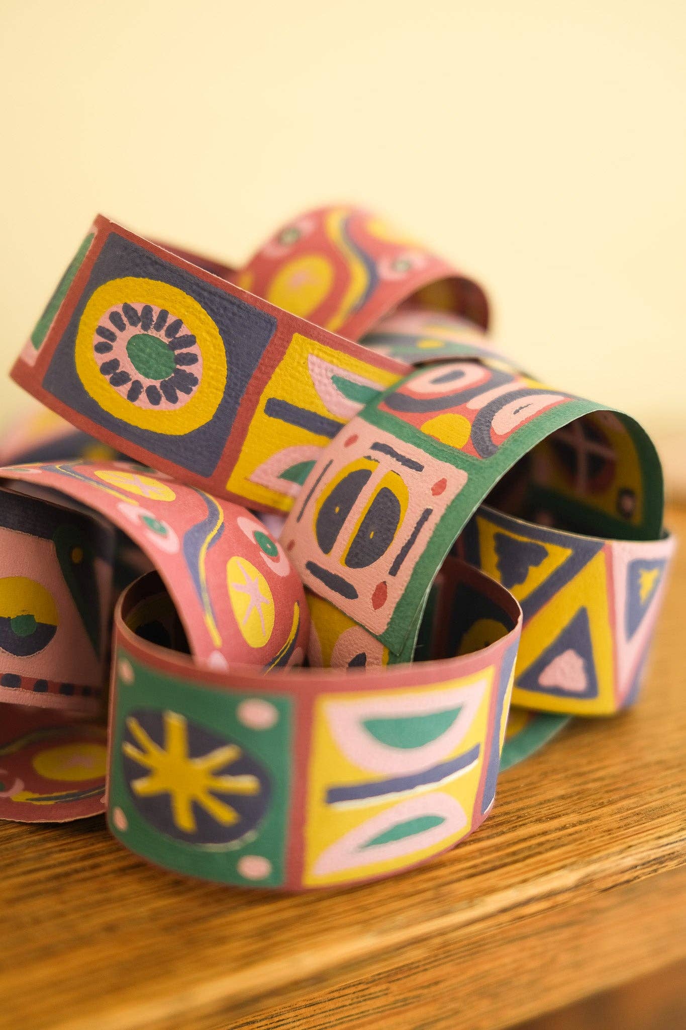 Artisan hand screen printed paper chain strips in soft colours