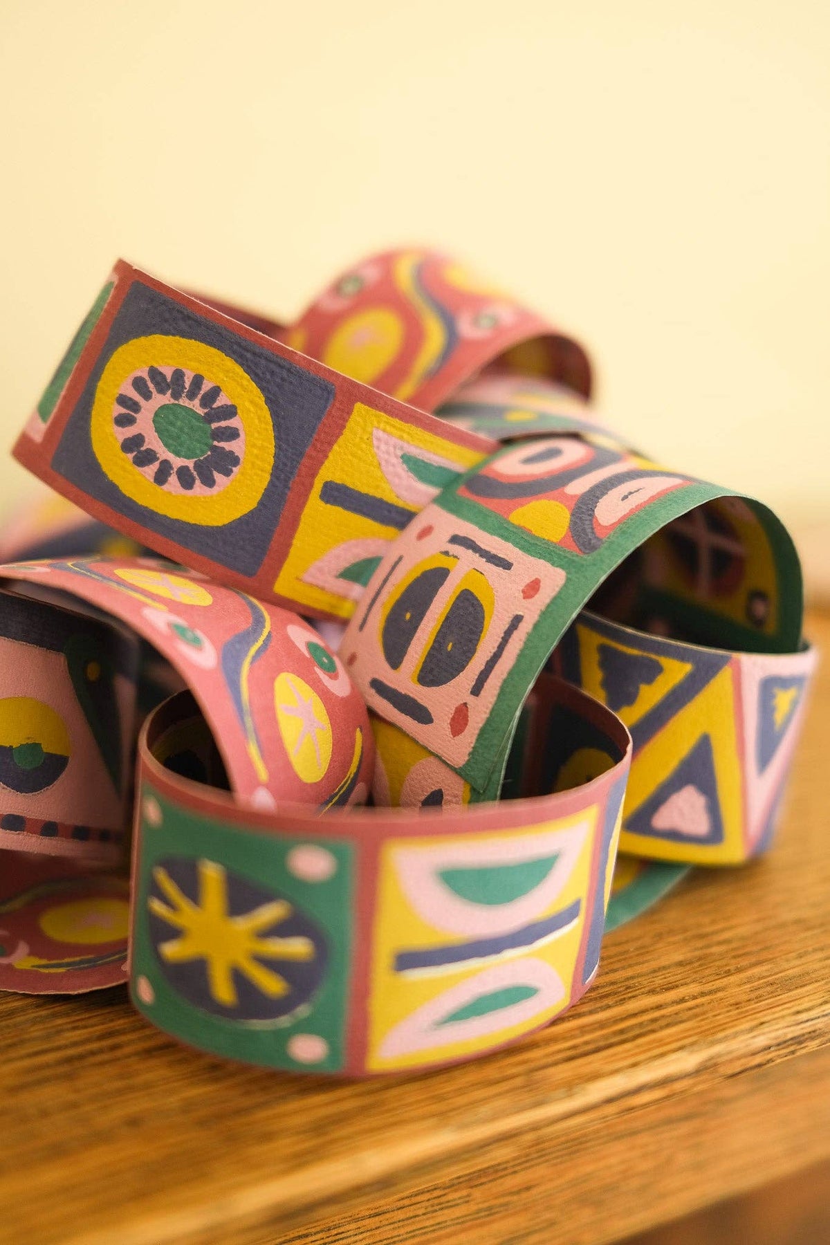 Artisan hand screen printed paper chain strips in soft colours