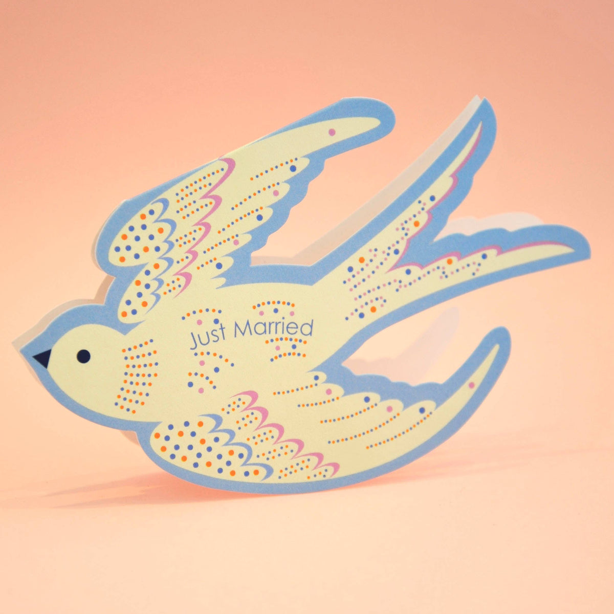 Close up of die-cut rocking bird wedding card design
