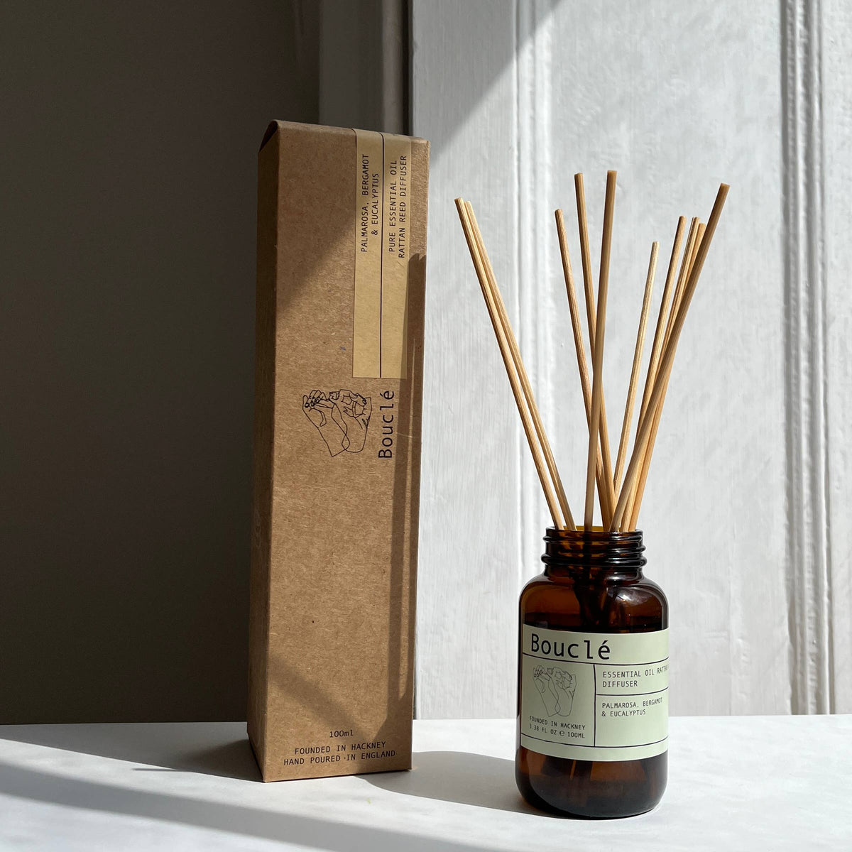 Hand-poured vegan essential oil reed diffuser with natural reeds