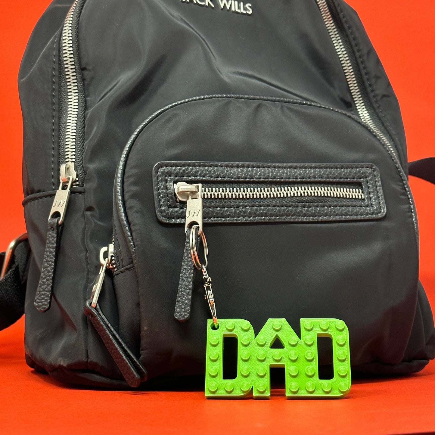 Collection of colourful Dad brick style keyrings