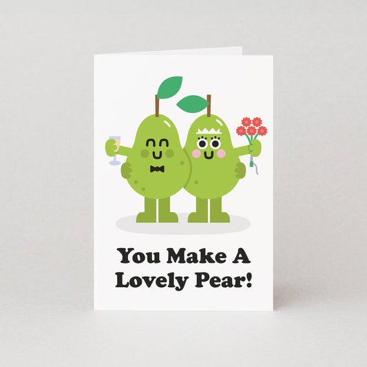 Illustrated wedding card with two pears as bride and groom, “You make a lovely pear” pun, A6 size, eco-friendly.