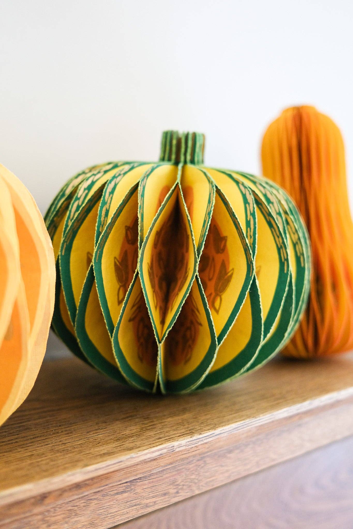 Recycled cotton paper gourd honeycomb decoration with cotton hanging loop, eco-friendly ornament.