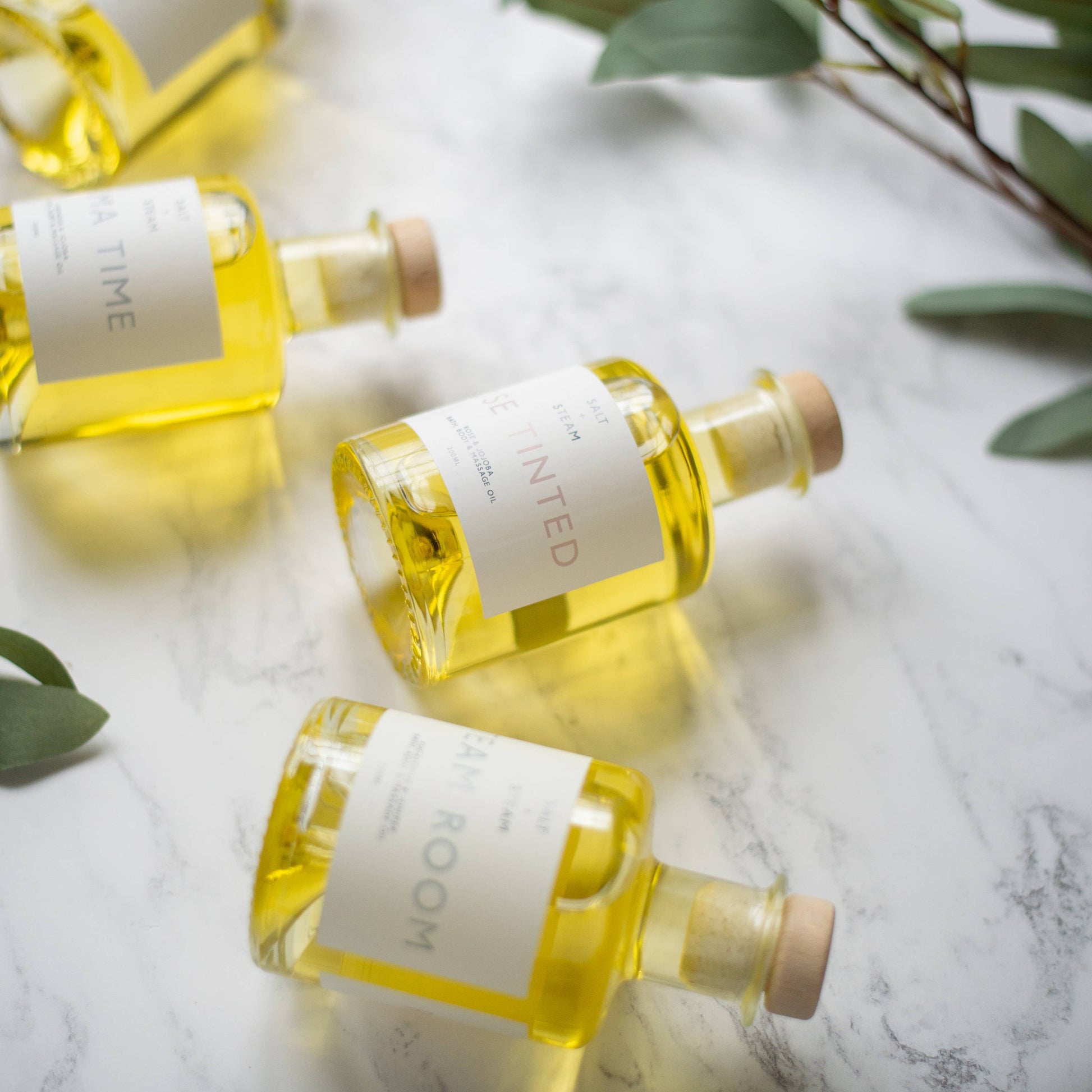 Steam Room eucalyptus juniper oil used for massage, bath, and daily skin hydration.