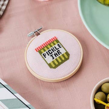 Finished Pickle Jar cross stitch design in a wooden hoop