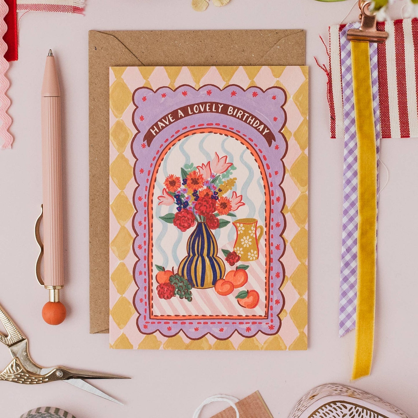 Birthday card with kraft envelope, showing textured card detail