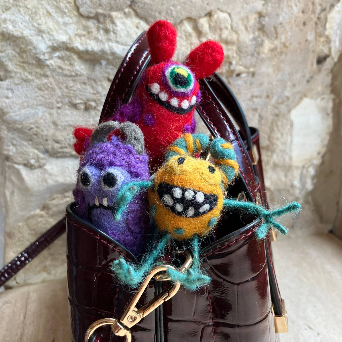 Handcrafted felt moody monster ornament for eco-friendly home