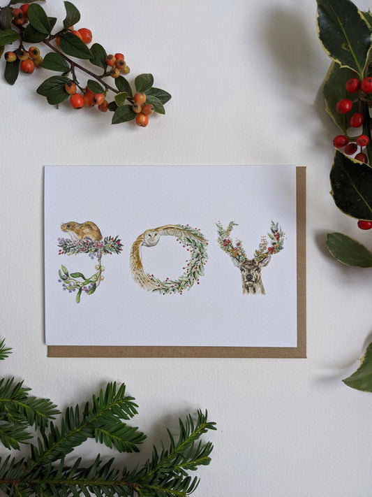Stag, Owl, Mouse 'JOY' Christmas card by Jessica Kendrew, woodland animals & festive foliage.