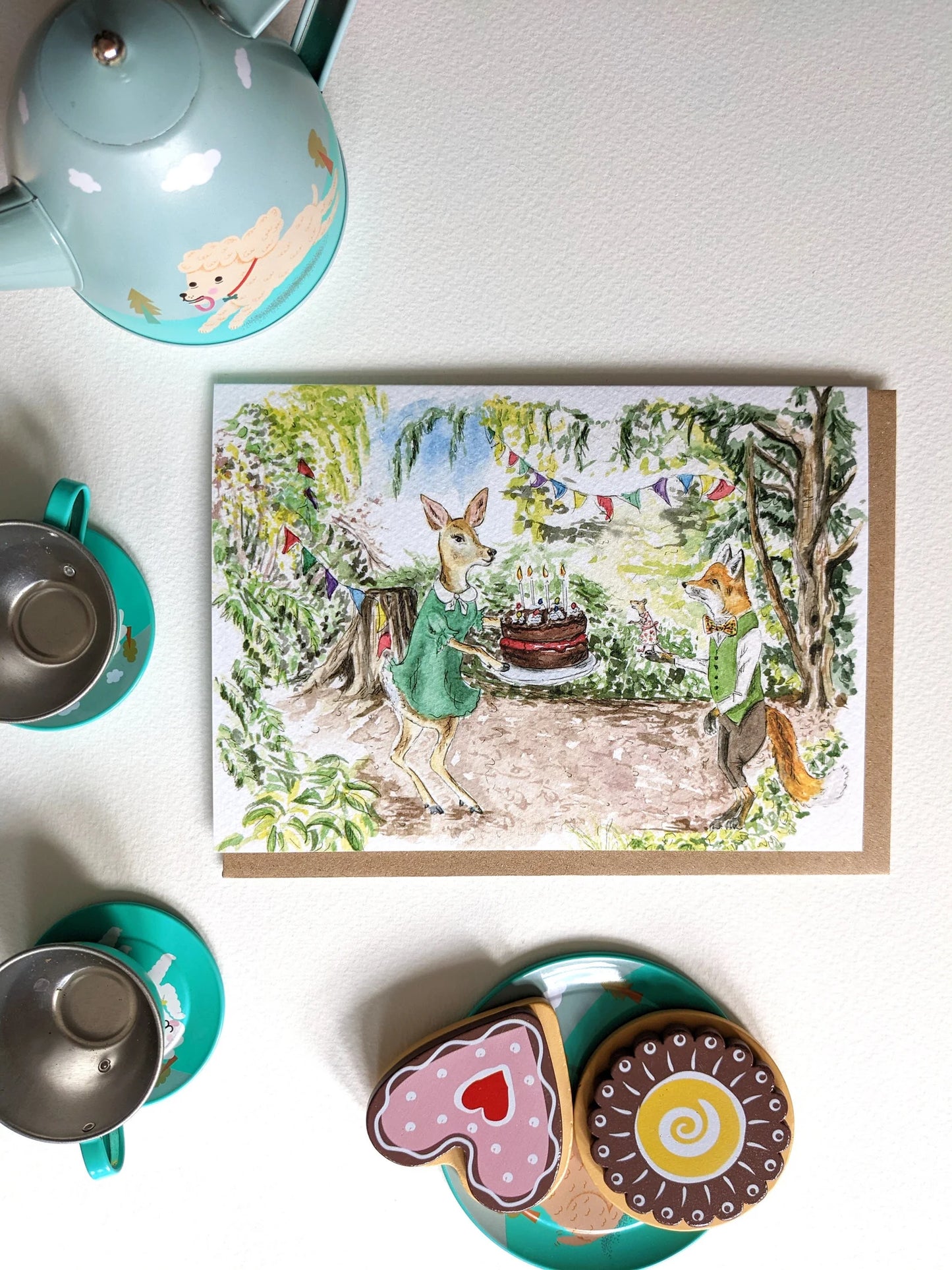 Jessica Kendrew's 'Tea Party Birthday Card' featuring a charming fox, mouse, and deer at a woodland tea party, eco-friendly card