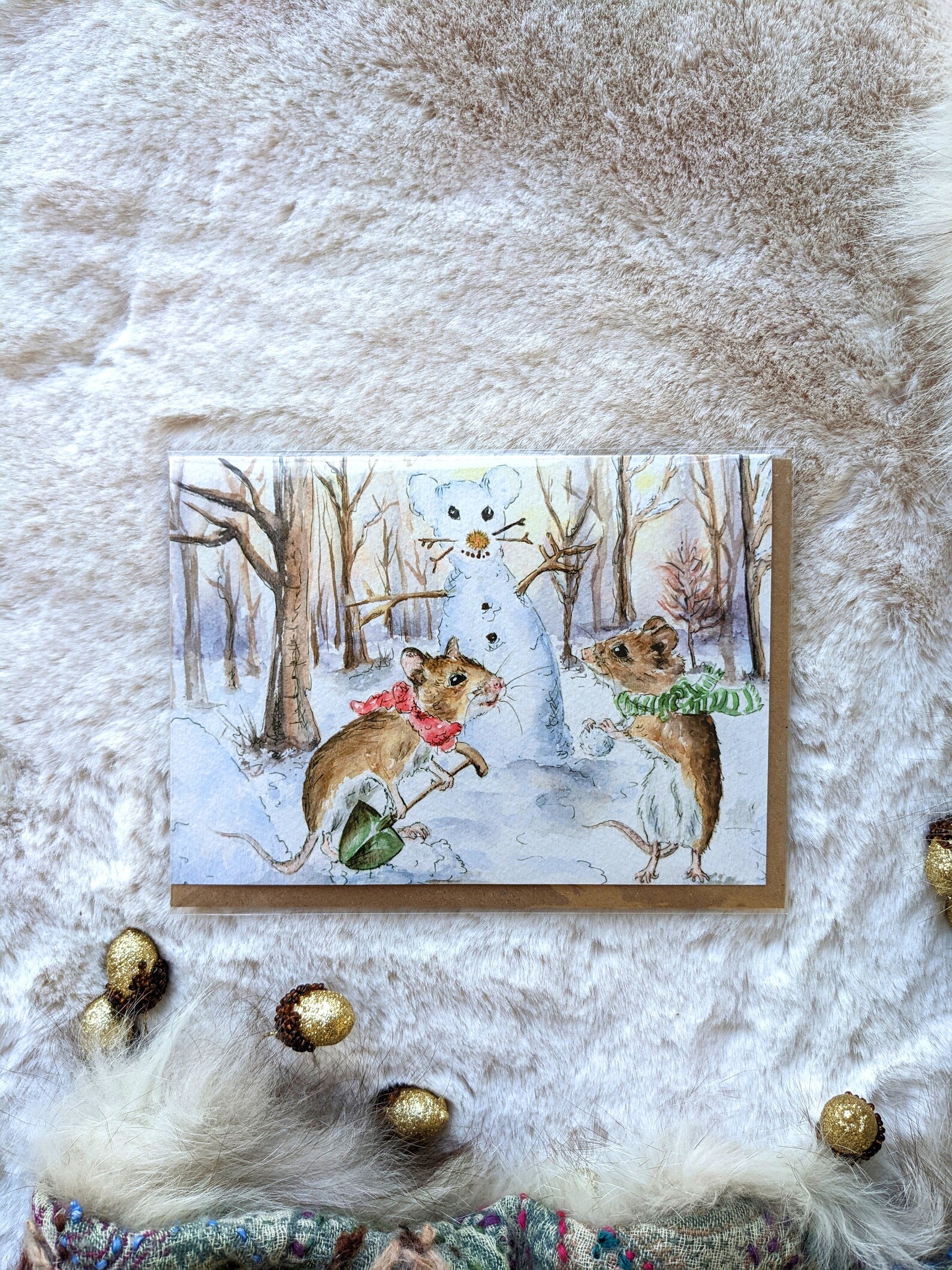 Close-up of the delightful illustration on the Jessica Kendrew Christmas Mice Snowman card, showing intricate details of mice and snowman.