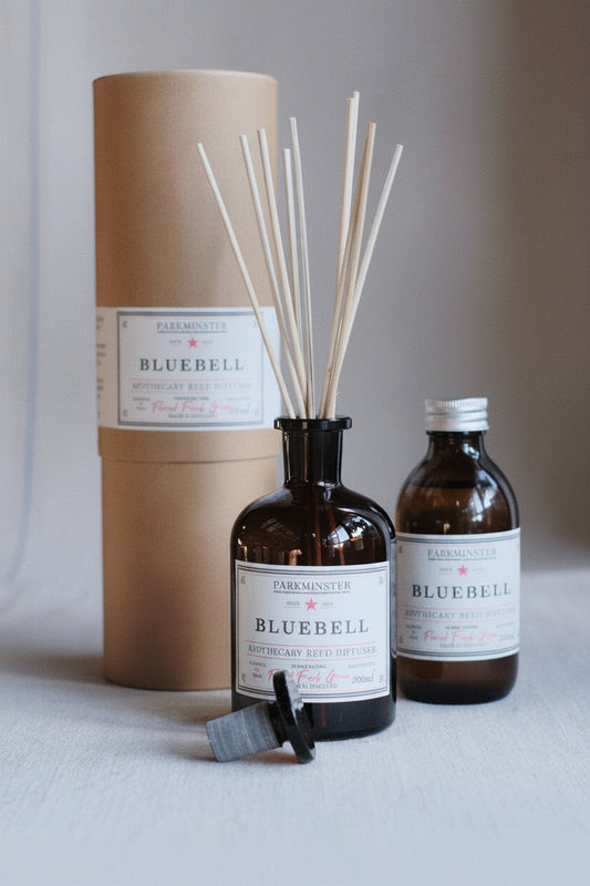 Parkminster Bluebell Apothecary Glass Diffuser, with reeds and kraft cylinder packaging.