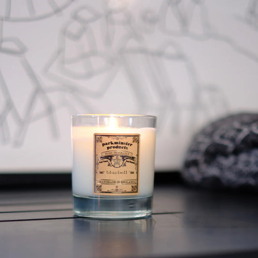 Large 220g soy candle in clear glass jar labelled ‘Bluebell’, handmade by Parkminster with floral green and citrus scent blend.