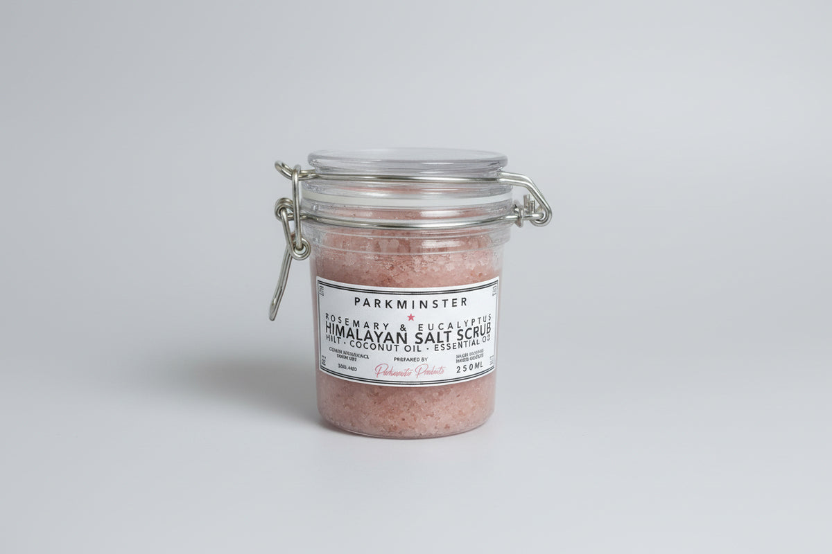 Rosemary and Eucalyptus Himalayan Salt Body Scrub in glass jar with natural exfoliating salt texture