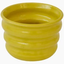 Handcrafted Ripple Beaker in Chartreuse. Handcrafted from stoneware clay, this colourful ceramic beaker with distinctive ripple texture is ideal for your morning coffee, a wine with friends or even a good old cup of water. The quirky rippled form provides a playful aesthetic whilst also being extremely ergonomic to hold, perfect for slotting your fingers comfortably into the grooves. 7 cm high and 9cm wide at the rim.