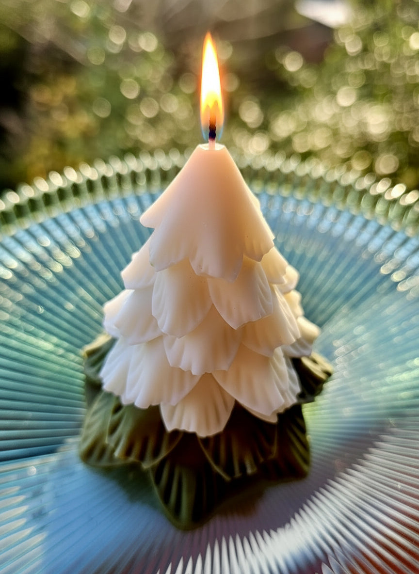 Kind As Folk Handmade Soy Wax Christmas Tree Candle burning with a soft glow