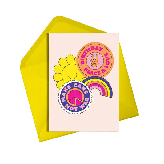 Eco-friendly 'Make Cake Not War' birthday card with a yellow envelope