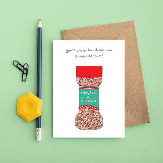 Beautiful hand-drawn hundreds and thousands jar, accompanied by the phrase "you're one in hundreds and thousands mum!" A delightful means of expressing love for your mother on her birthday or Mother's Day.