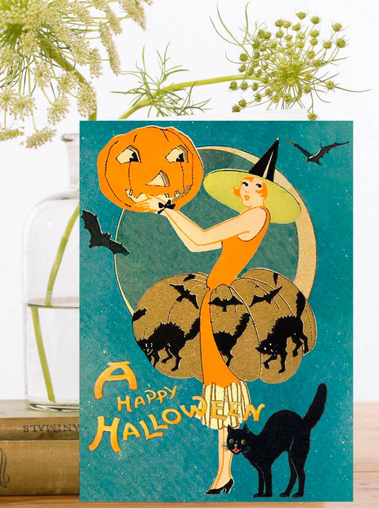 Black Cat and Pumpkin Halloween greeting card featuring a stylish witch and bats